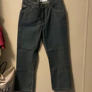 Men's Relaxed Fit Jeans in Charcoal by [Brand]
